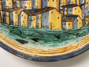 A large Italian maiolica dish with a view on San Gimignano, Deruta, 16/17th C.