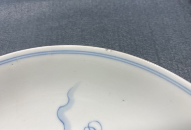 Een Chinees blauw-wit bord met onsterfelijken, Yongzheng merk en periode