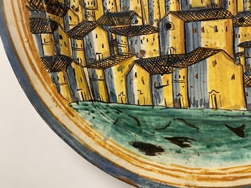 A large Italian maiolica dish with a view on San Gimignano, Deruta, 16/17th C.