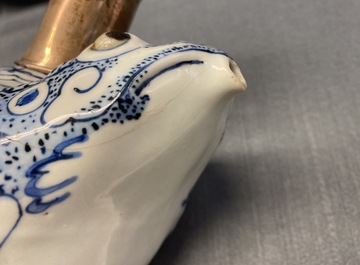 A Chinese silver-mounted blue and white 'frog' kendi, Wanli