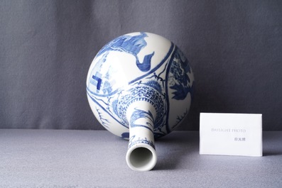 A Chinese blue and white 'qilin' bottle vase, 19th C.