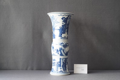 A Chinese blue and white 'gu' vase with figurative design, Kangxi