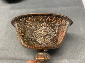 A pair of Tibetan silvered copper alloy altar bowls, 19/20th C.
