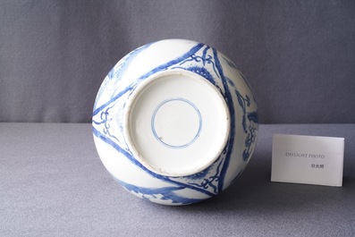 A Chinese blue and white 'qilin' bottle vase, 19th C.