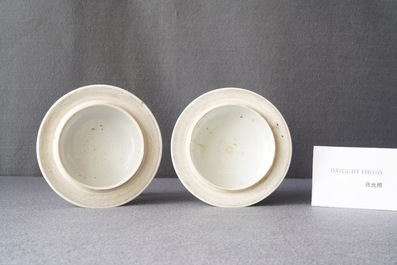 A pair of Chinese blue and white 'hunting scene' jars and covers, Kangxi