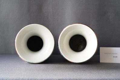 A pair of Chinese famille rose rouleau vases, 19th C.