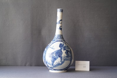 A Chinese blue and white 'qilin' bottle vase, 19th C.