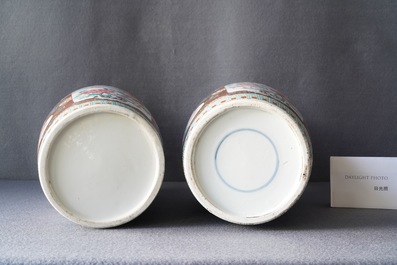 A pair of Chinese famille rose rouleau vases, 19th C.