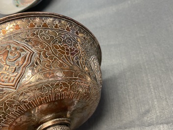 A pair of Tibetan silvered copper alloy altar bowls, 19/20th C.