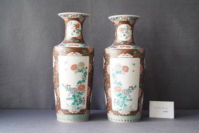 A pair of Chinese famille rose rouleau vases, 19th C.