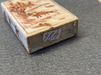 Four Chinese blue and white and iron-red snuff bottles, 19/20th C.