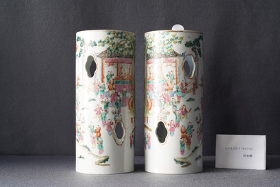 A pair of reticulated Chinese famille rose '100 boys' hat stands, Qianlong mark, 19th C.