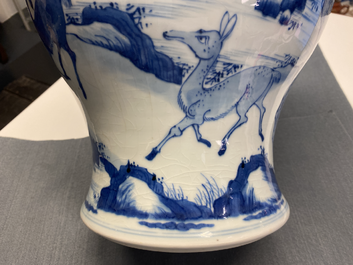 A pair of Chinese blue and white 'deer and crane' vases, Kangxi