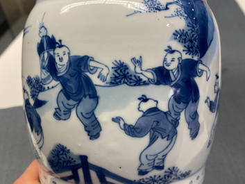 A Chinese blue and white 'gu' vase with figurative design, Kangxi