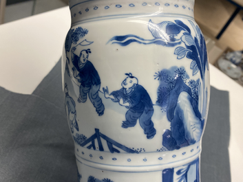 A Chinese blue and white 'gu' vase with figurative design, Kangxi