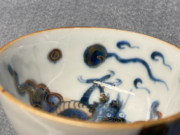 Six Chinese doucai 'dragon' cups and saucers, Kangxi