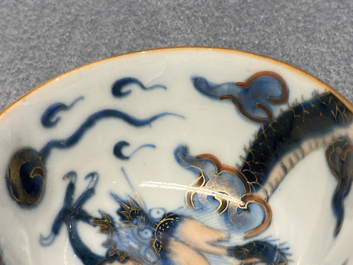 Six Chinese doucai 'dragon' cups and saucers, Kangxi