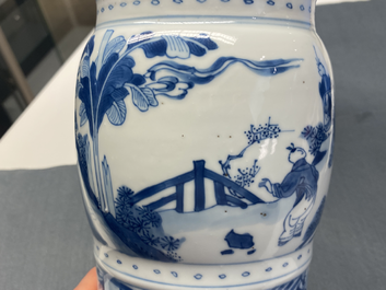 A Chinese blue and white 'gu' vase with figurative design, Kangxi