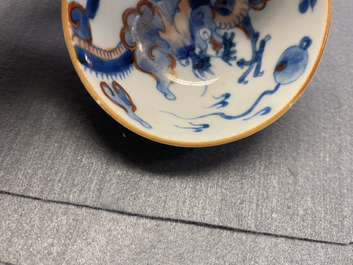 Six Chinese doucai 'dragon' cups and saucers, Kangxi