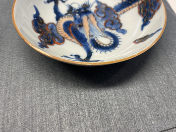 Six Chinese doucai 'dragon' cups and saucers, Kangxi