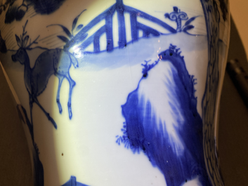 A pair of Chinese blue and white 'deer and crane' vases, Kangxi