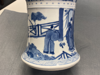 A Chinese blue and white 'gu' vase with figurative design, Kangxi