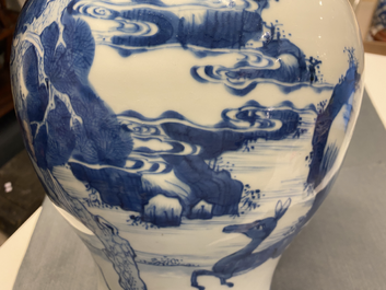 A pair of Chinese blue and white 'deer and crane' vases, Kangxi