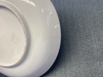 A Chinese famille rose ruby-ground cup and saucer, Yongzheng