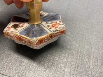A pair of very large Chinese Imari-style teapots and covers, Kangxi