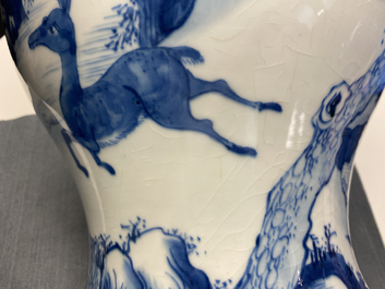 A pair of Chinese blue and white 'deer and crane' vases, Kangxi