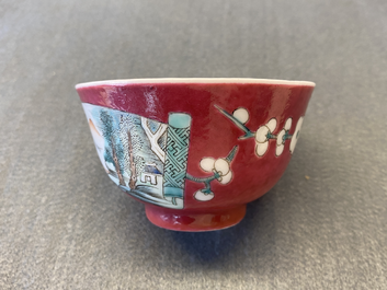 A Chinese famille rose ruby-ground cup and saucer, Yongzheng