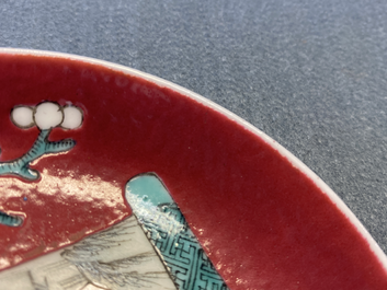 A Chinese famille rose ruby-ground cup and saucer, Yongzheng