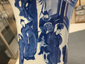 A Chinese blue and white 'gu' vase with figurative design, Kangxi