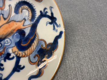 Six Chinese doucai 'dragon' cups and saucers, Kangxi