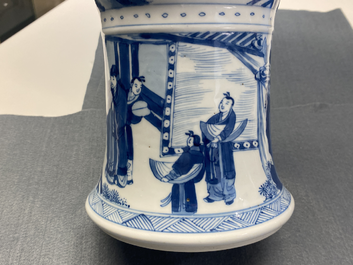A Chinese blue and white 'gu' vase with figurative design, Kangxi