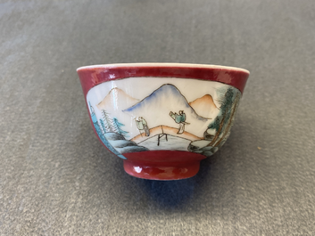 A Chinese famille rose ruby-ground cup and saucer, Yongzheng