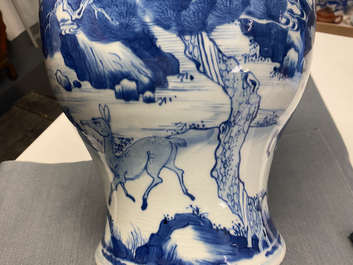 A pair of Chinese blue and white 'deer and crane' vases, Kangxi