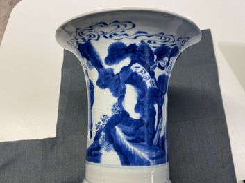 A Chinese blue and white 'gu' vase with immortals, Kangxi