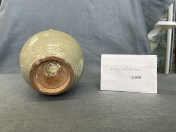 A Chinese Longquan celadon five-spouted urn, Song