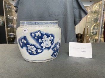 A Chinese blue, white and copper red 'prunus flowers' bowl, Kangxi