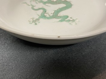 A Chinese incised and green-glazed 'dragon' dish, Hongzhi mark, Ming