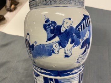 A Chinese blue and white 'gu' vase with figurative design, Kangxi