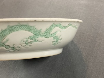 A Chinese incised and green-glazed 'dragon' dish, Hongzhi mark, Ming