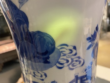 A Chinese blue and white 'gu' vase with immortals, Kangxi
