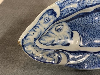 A pair of Dutch Delft blue and white 'herring' dishes, 18th C.