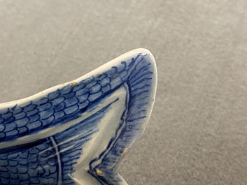 A pair of Dutch Delft blue and white 'herring' dishes, 18th C.