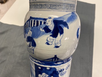 A Chinese blue and white 'gu' vase with figurative design, Kangxi