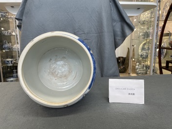 A Chinese blue, white and copper red 'prunus flowers' bowl, Kangxi
