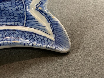 A pair of Dutch Delft blue and white 'herring' dishes, 18th C.