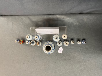 Fifteen Chinese mostly blue and white miniature vases, Kangxi